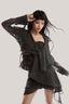 Black Ruffle Asymmetric Shirt from MUST HAVE at The Viet Concept 2