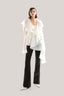 White Ruffle Asymmetric Shirt from MUST HAVE at The Viet Concept 